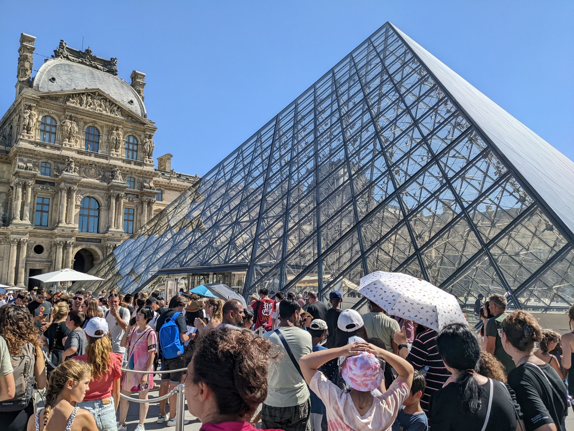 The Pyramid entrance to the Louvre Museum in July 2022.